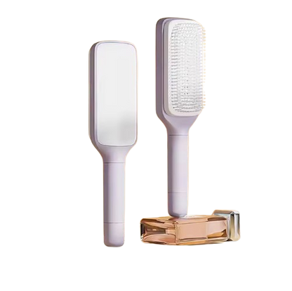 Drehbare selbstreinigende Haarbürste